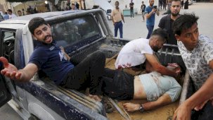 Saldırı altındaki Gazze'de 22 gün geride kaldı