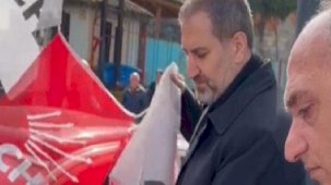 Yere düşen CHP bayrağını AK Parti'li Şen topladı