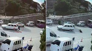 Geri hareket yapan araba, bastonla yürüyen yaşlı adama çarptı