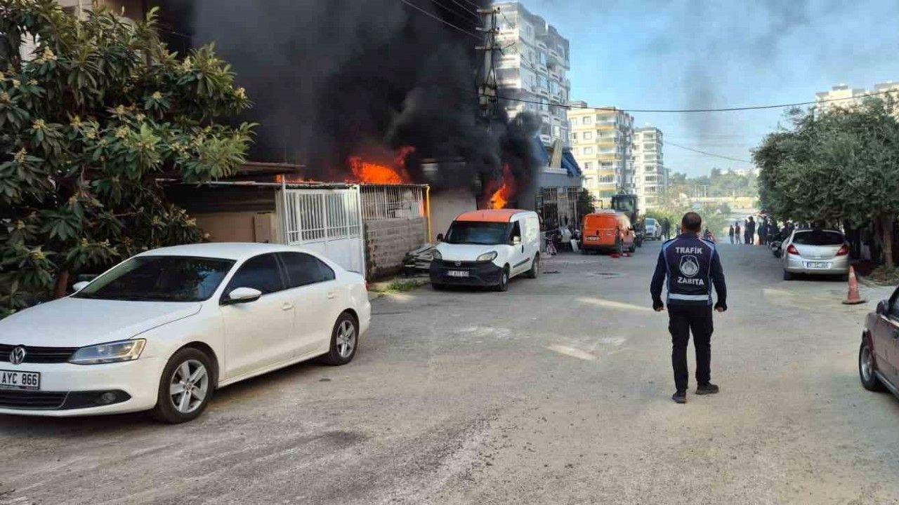 İş yerinde başlayan yangında alevler eve sıçradı