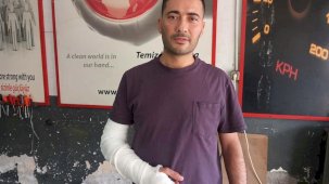 Ayırmaya çalıştığı kavga nedeniyle 3 yaşındaki oğlunun yanında saldırıya uğradı