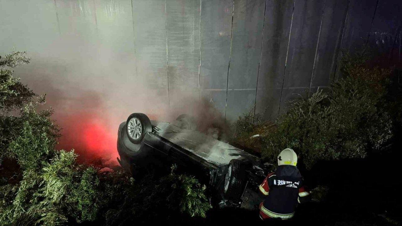 Kaza yapıp ters dönen elektrikli araçtaki yangına ekipler müdahale etti